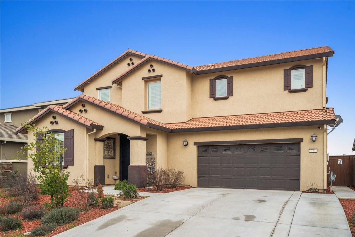 12791 Evanston Way Rancho Cordova, CA 95742 - Photo 30 of 54 a front view of a house with yard