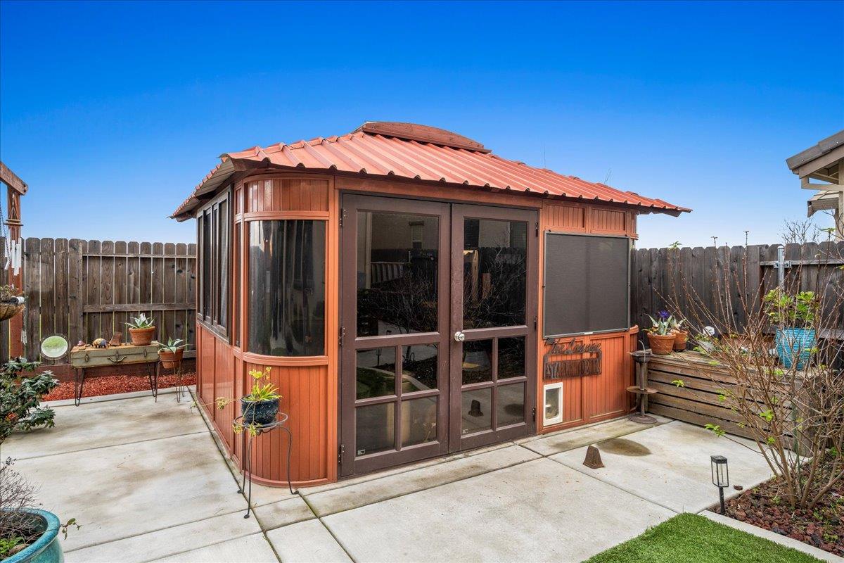 12791 Evanston Way Rancho Cordova, CA 95742 - Photo 33 of 54 a view of outdoor sitting space and wooden deck