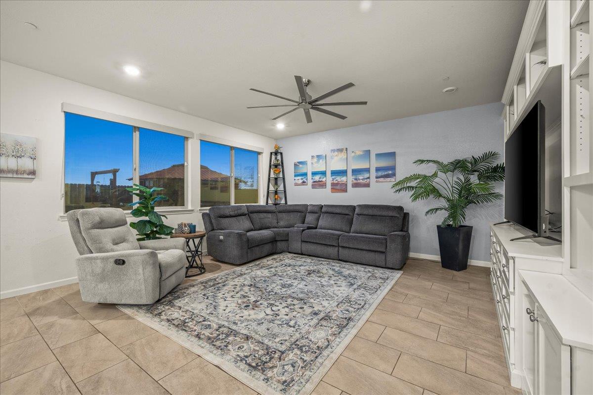 12791 Evanston Way Rancho Cordova, CA 95742 - Photo 48 of 54 Spacious family room off the kitchen with built in entertainment wall unit with storage GALORE!