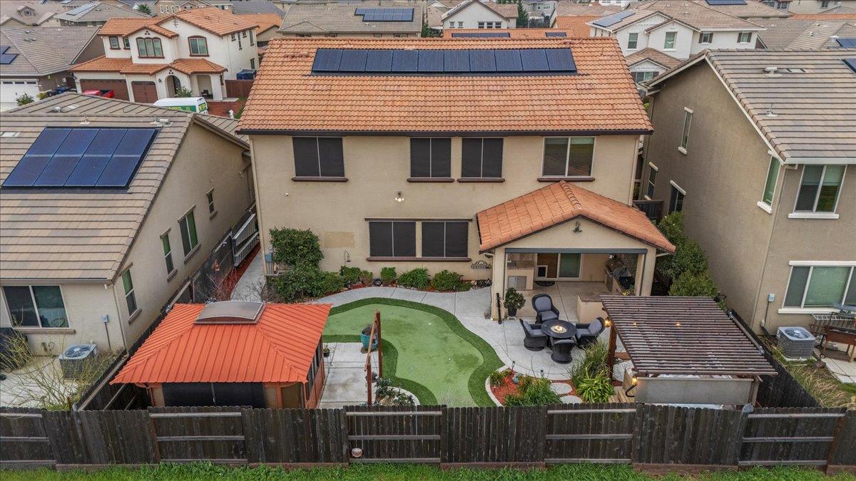 12791 Evanston Way Rancho Cordova, CA 95742 - Photo 7 of 54 a view of multiple houses with a yard