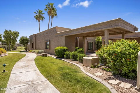 a house view with a garden space