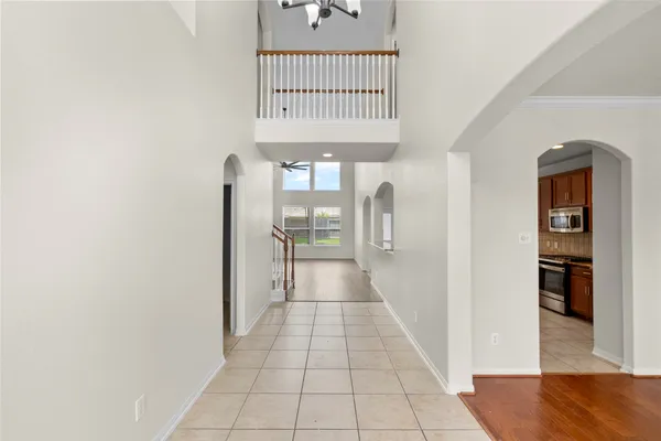 a view of a hallway with a white walls