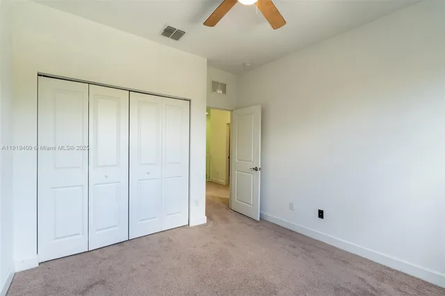an empty room with closet