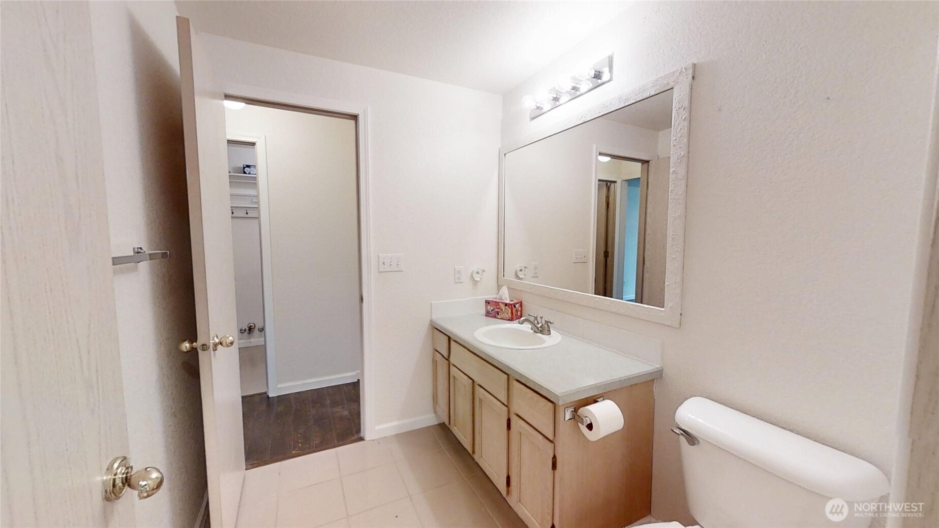 6039 Merlot Lane Southeast Lacey, WA 98513 - Photo 11 of 21 a bathroom with a sink and a mirror