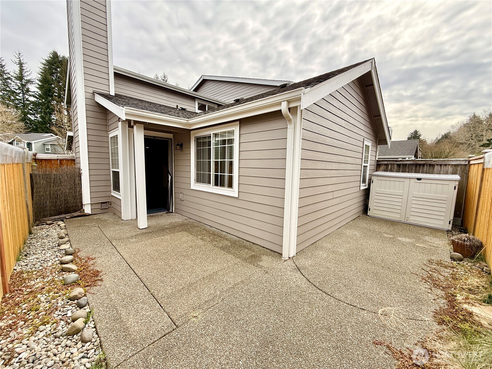 6039 Merlot Lane Southeast Lacey, WA 98513 - Photo 17 of 21 a view of a house with a backyard