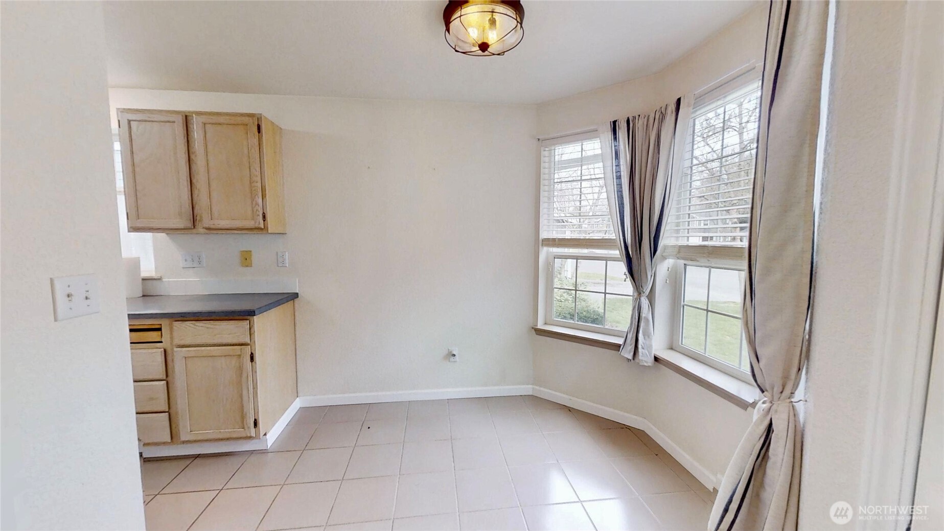 6039 Merlot Lane Southeast Lacey, WA 98513 - Photo 2 of 21 a view of an entryway with kitchen