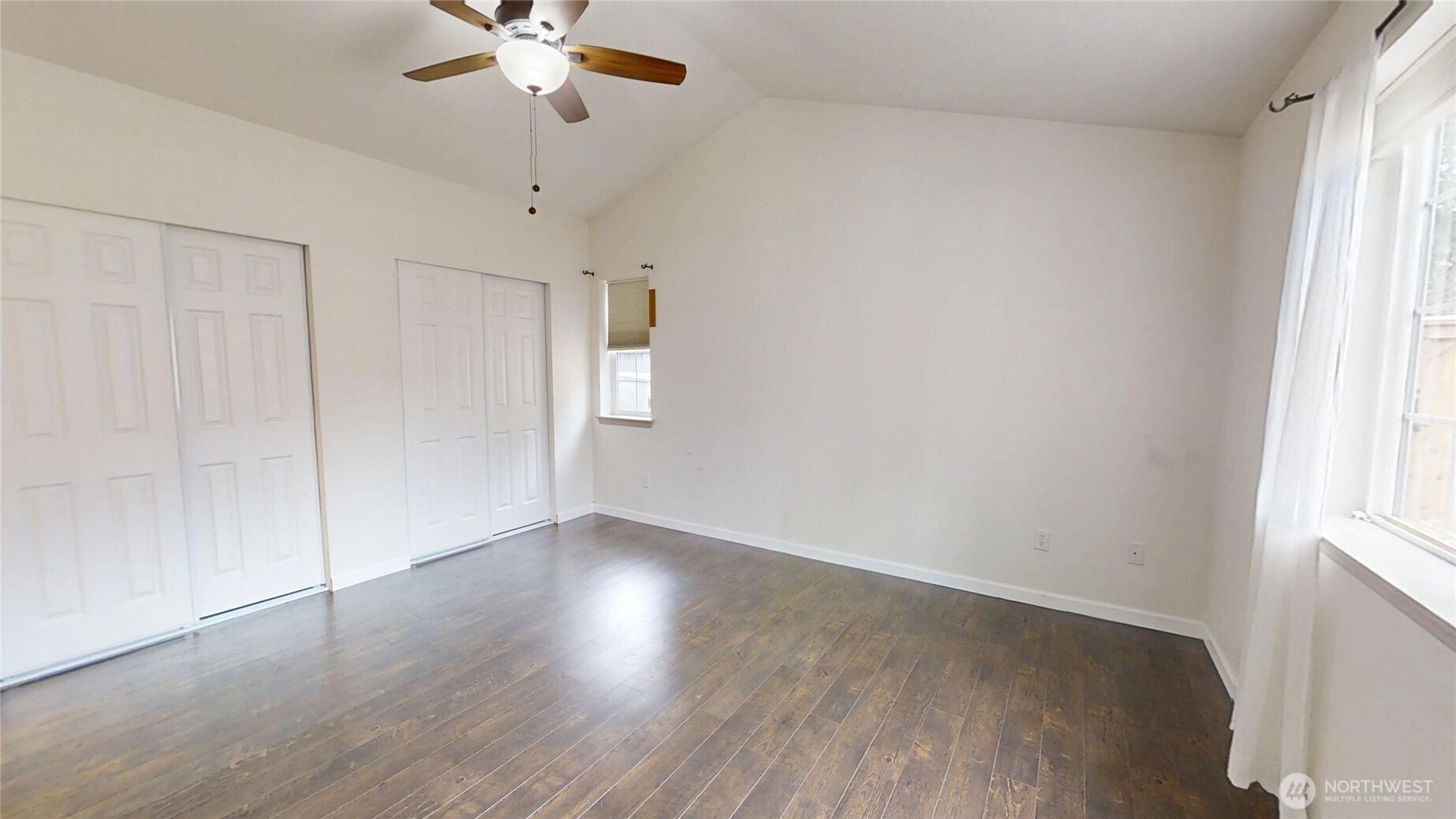 6039 Merlot Lane Southeast Lacey, WA 98513 - Photo 8 of 21 wooden floor in an empty room with a window