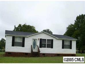 3030 Miller Road Salisbury, NC 28147 - Photo 1 of 1 a front view of a house with a yard