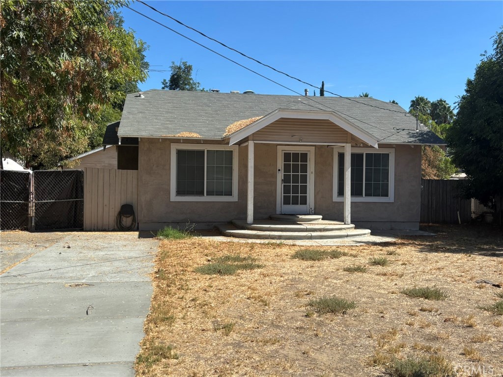 4869 Rubidoux Avenue Riverside, CA 92504 - Photo 1 of 1 a front view of a house with a yard