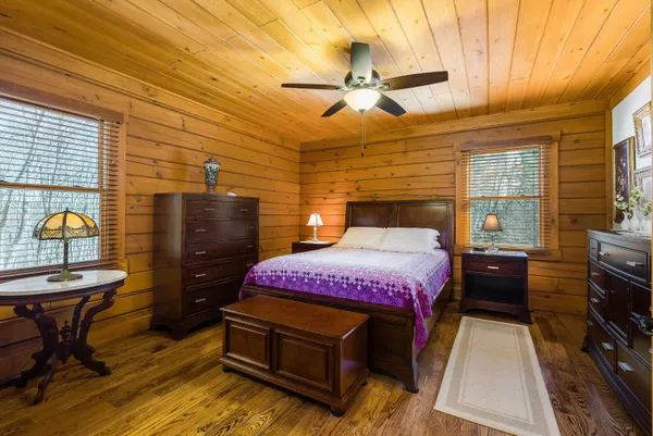 a view of a house with snow on the road