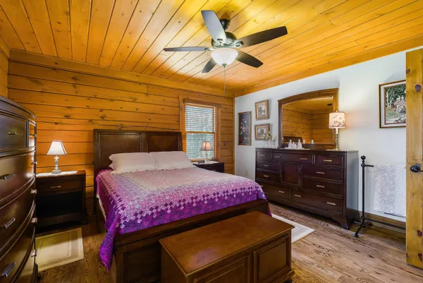 a room with gym equipment and a table