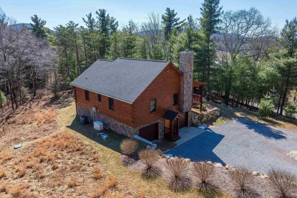 an aerial view of residential house and outdoor space