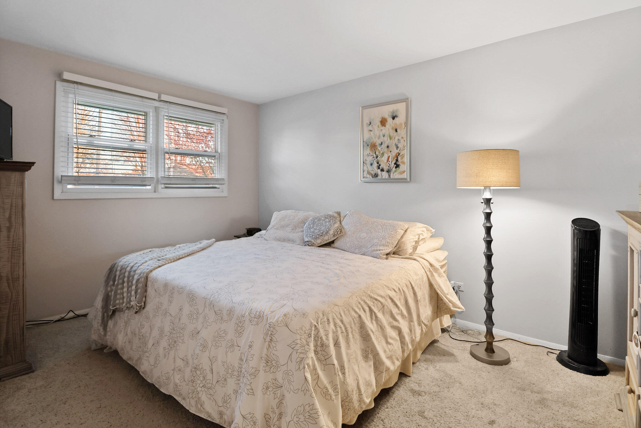 8036 Beech Avenue Munster, IN 46321 - Photo 15 of 28 a bedroom with bed and window
