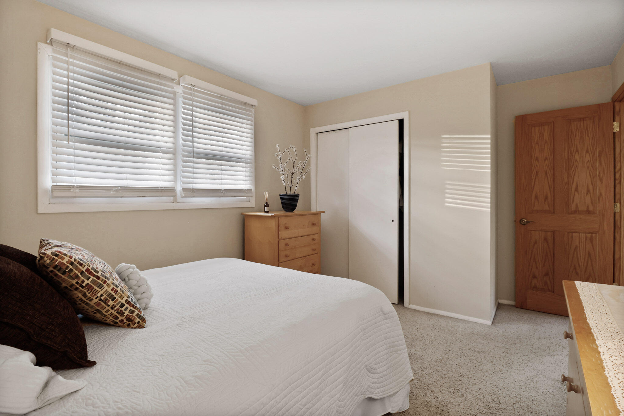 8036 Beech Avenue Munster, IN 46321 - Photo 16 of 28 a bedroom with a bed and a window