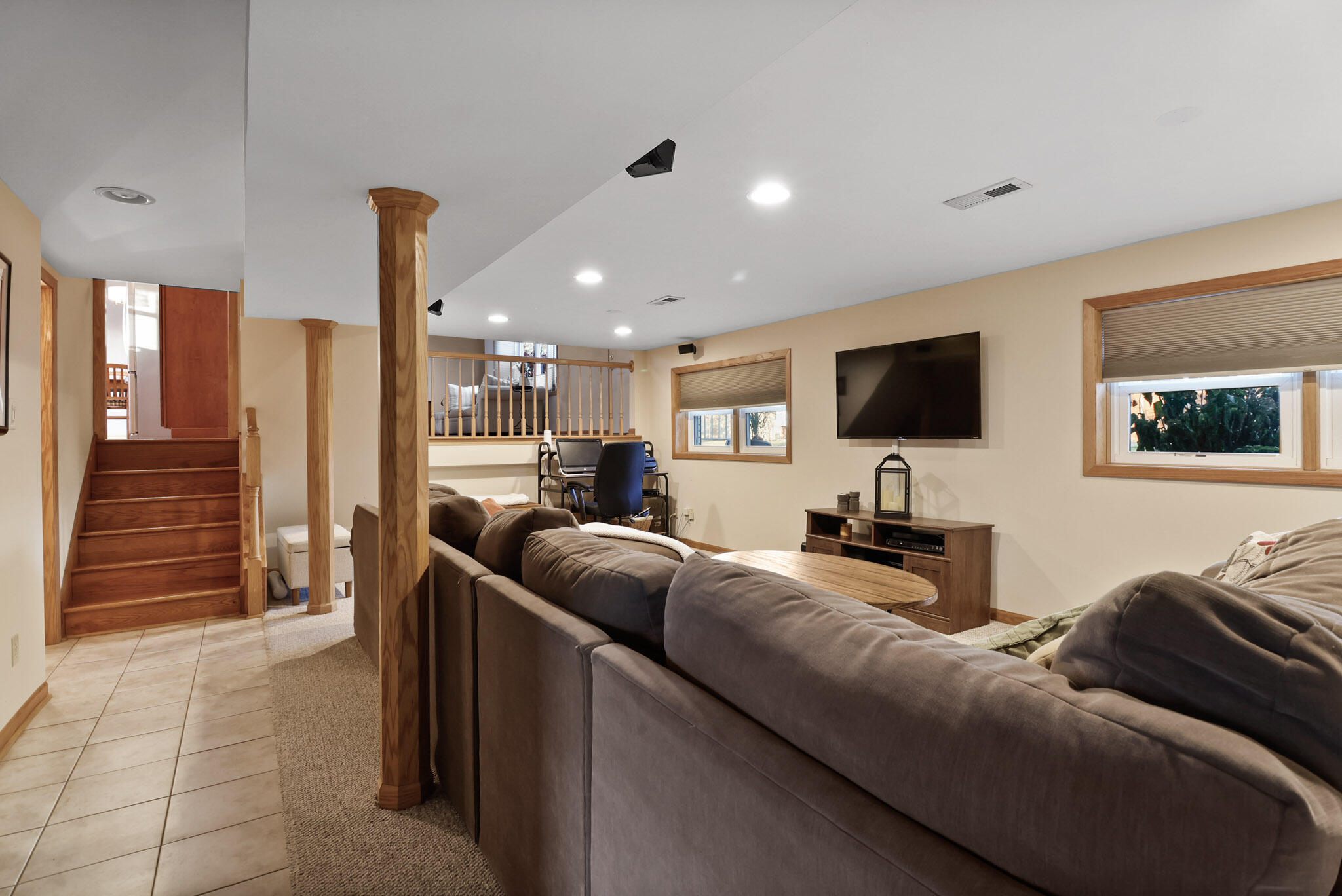 8036 Beech Avenue Munster, IN 46321 - Photo 20 of 28 a living room with furniture and a flat screen tv