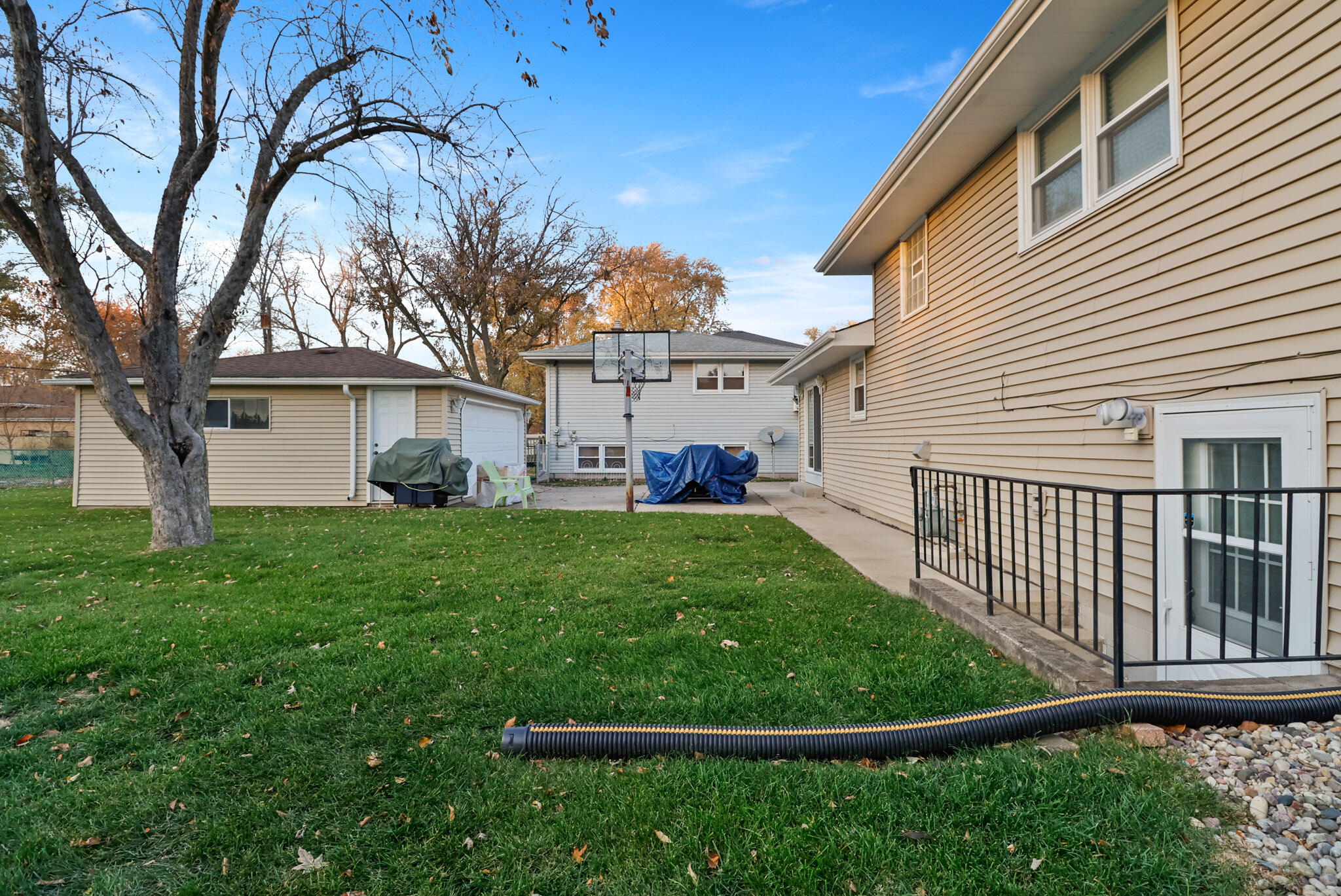 8036 Beech Avenue Munster, IN 46321 - Photo 27 of 28 a view of a house with backyard and tree