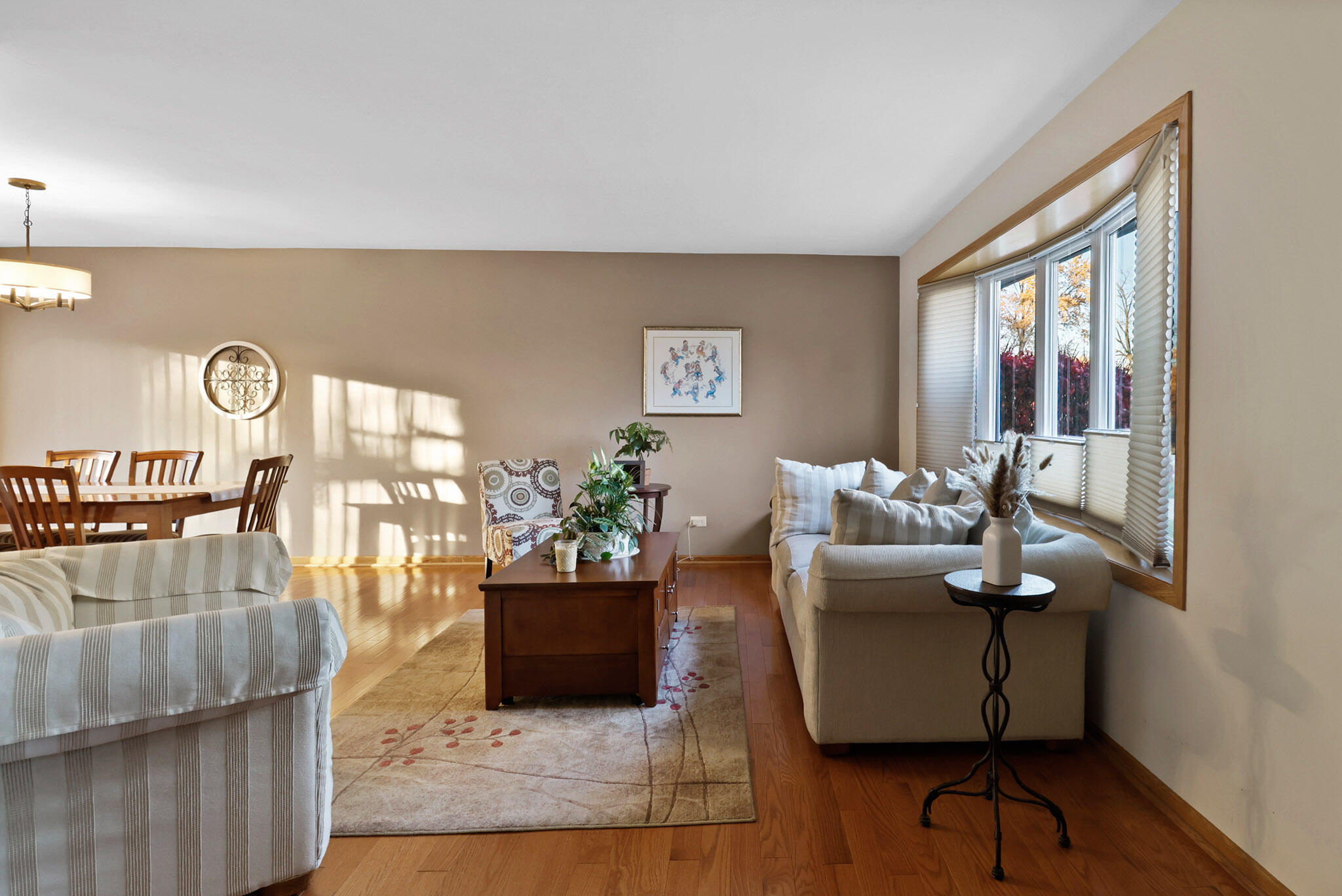 8036 Beech Avenue Munster, IN 46321 - Photo 3 of 28 a living room with furniture floor to ceiling window and wooden floor