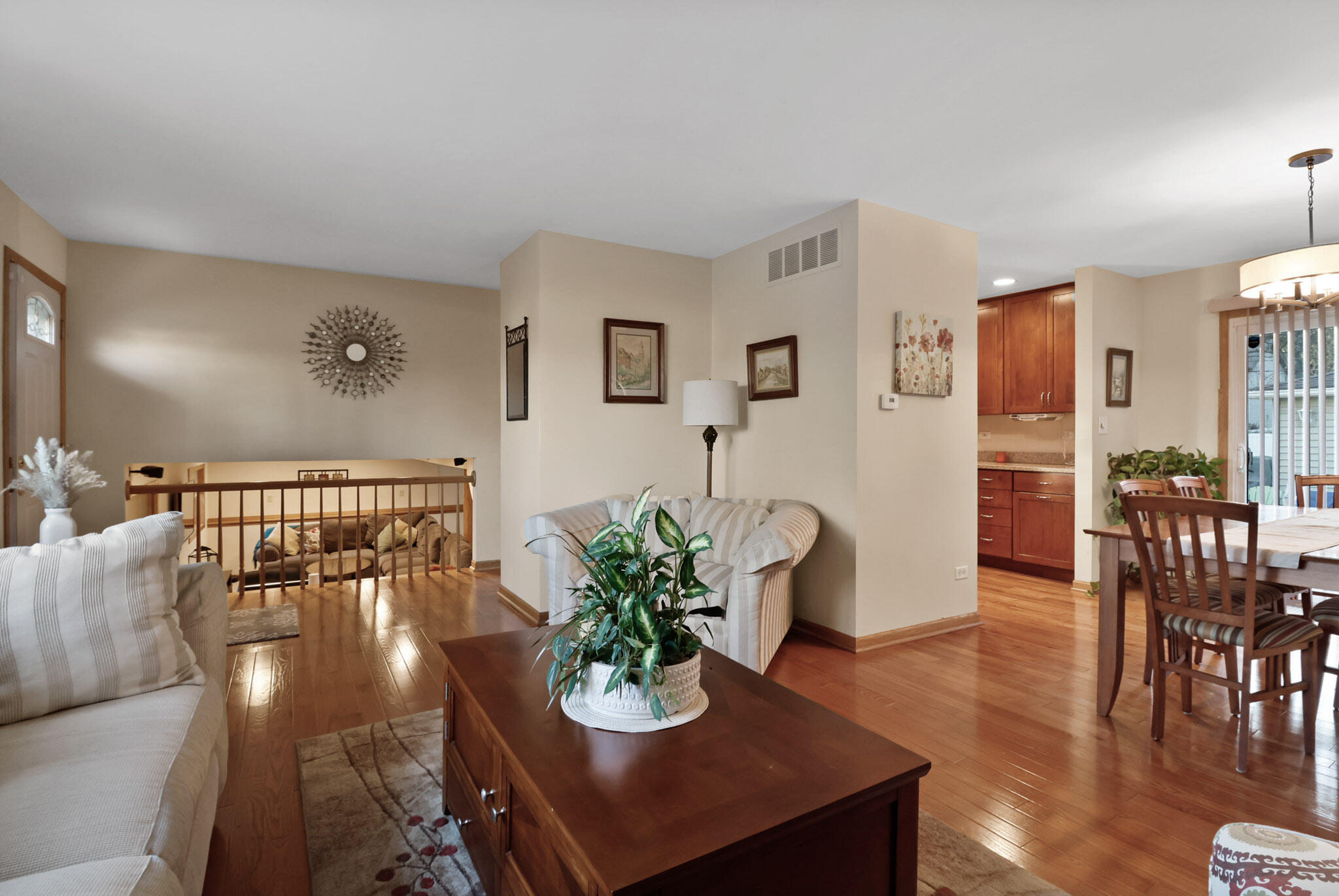 8036 Beech Avenue Munster, IN 46321 - Photo 4 of 28 a view of a dining room with furniture and wooden floor