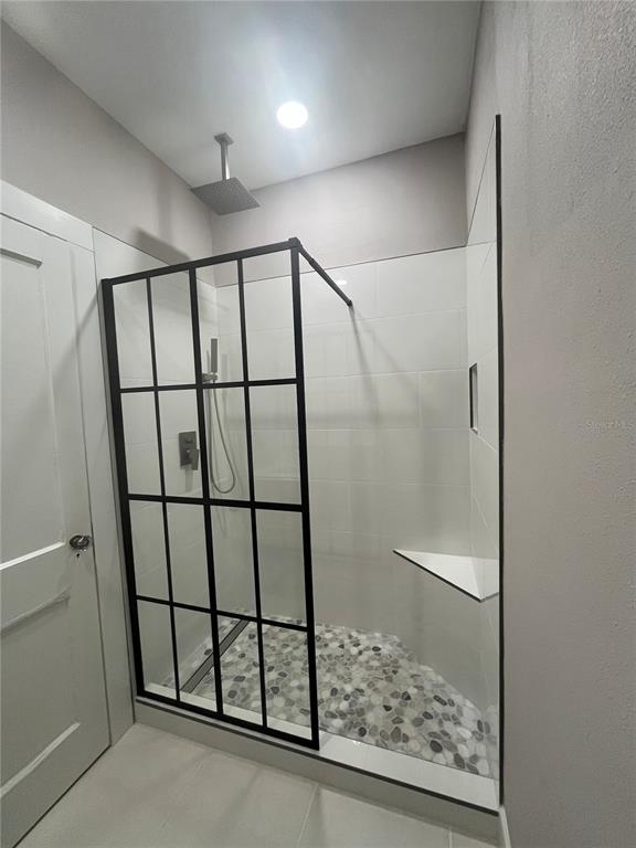3303 West Empedrado Street, Unit 4 Tampa, FL 33629 - Photo 13 of 16 a bathroom with a shower