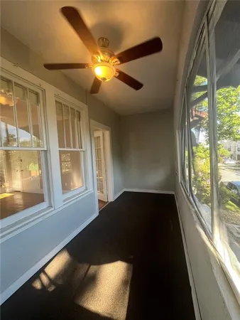 a view of an empty room and window