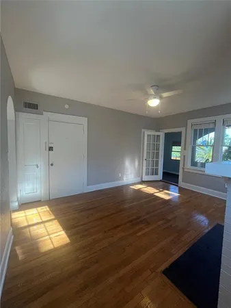 a view of an empty room and window