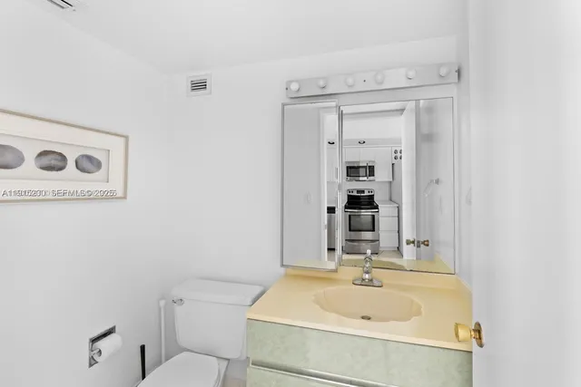 a bathroom with a sink and a toilet