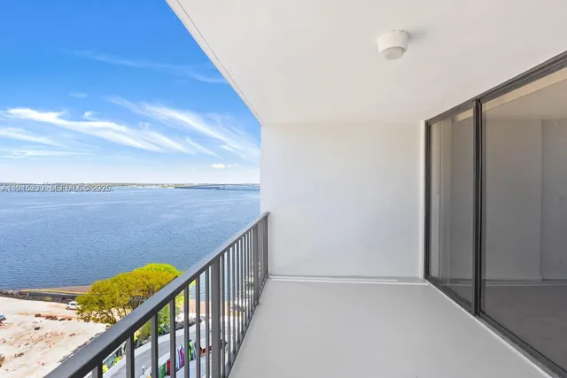 a view of balcony with furniture