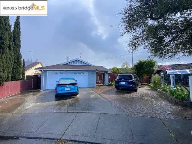 a car parked in front of a house