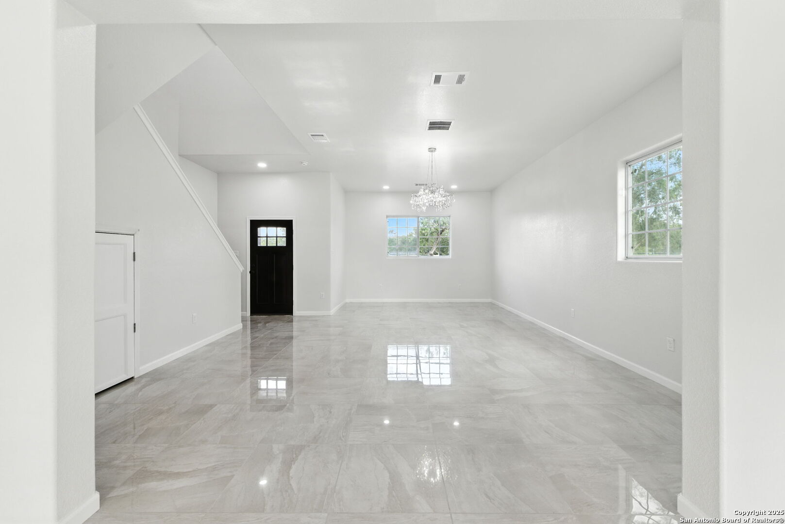 774 County Road 6843 Lytle, TX 78052 - Photo 18 of 63 an empty room with windows and closet