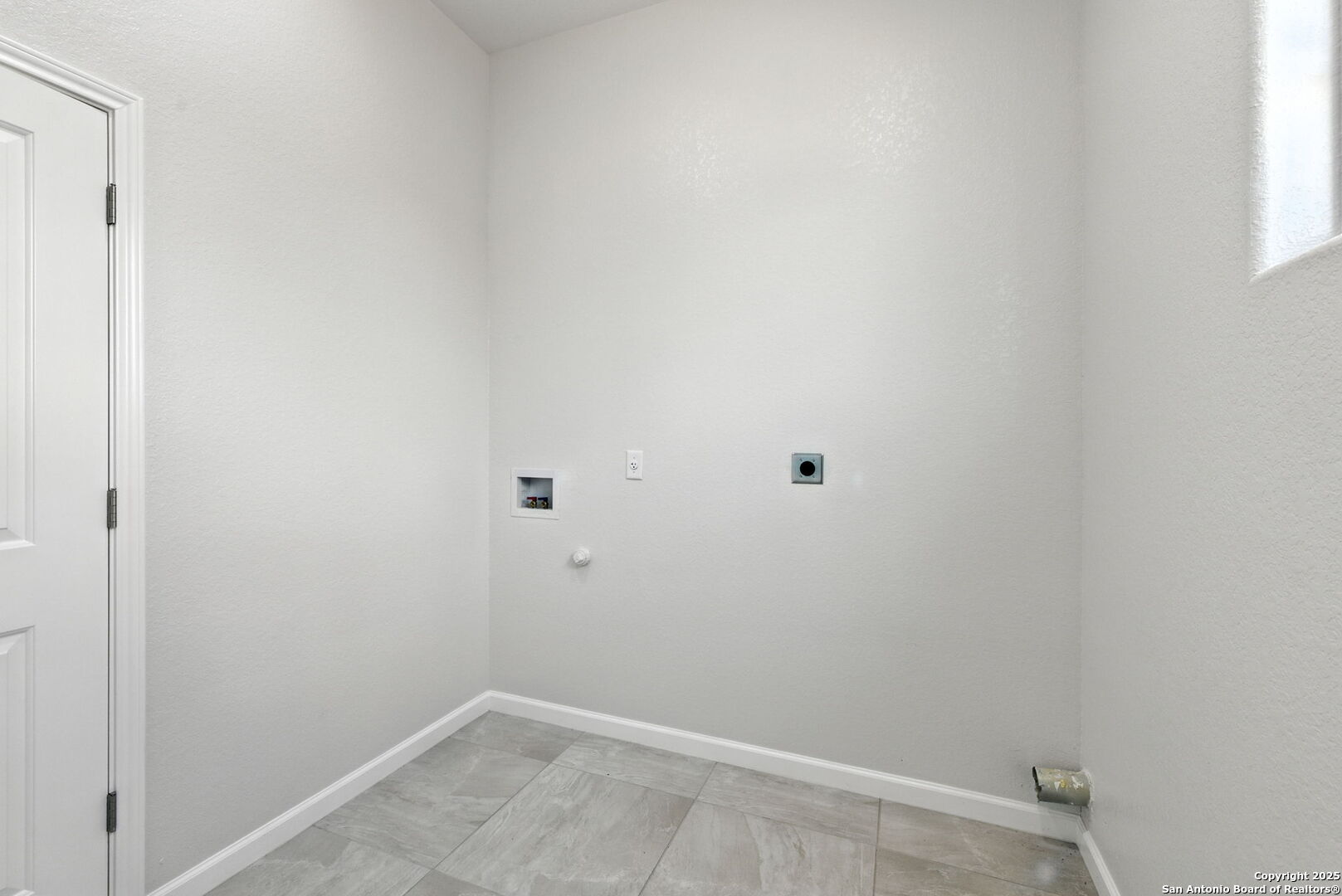 774 County Road 6843 Lytle, TX 78052 - Photo 31 of 63 a view of small space with racks on the wall