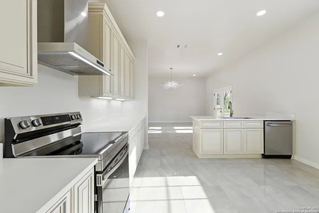 an empty room with a empty space and windows