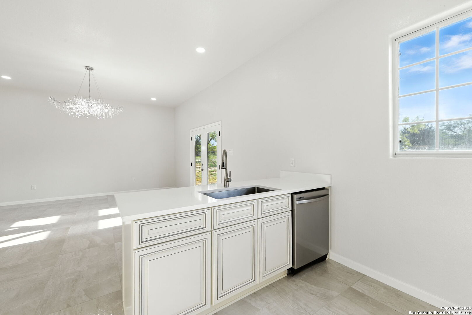 774 County Road 6843 Lytle, TX 78052 - Photo 33 of 63 a kitchen with a sink and a window