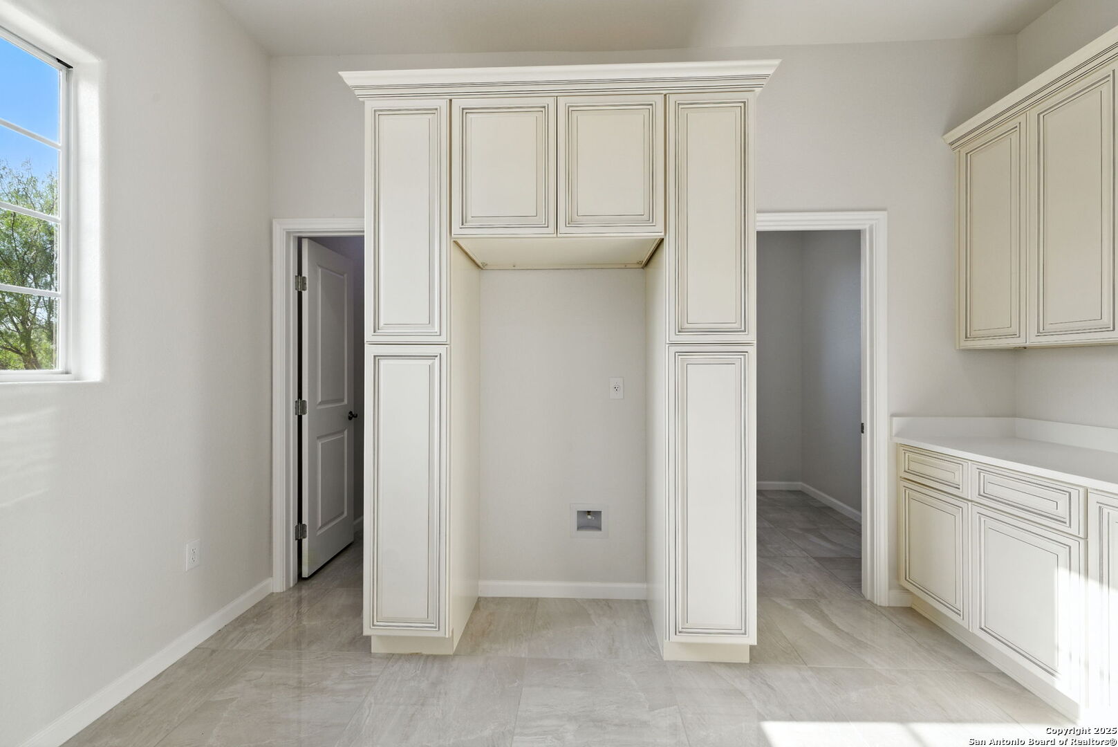774 County Road 6843 Lytle, TX 78052 - Photo 34 of 63 a view of cabinets and window in a room