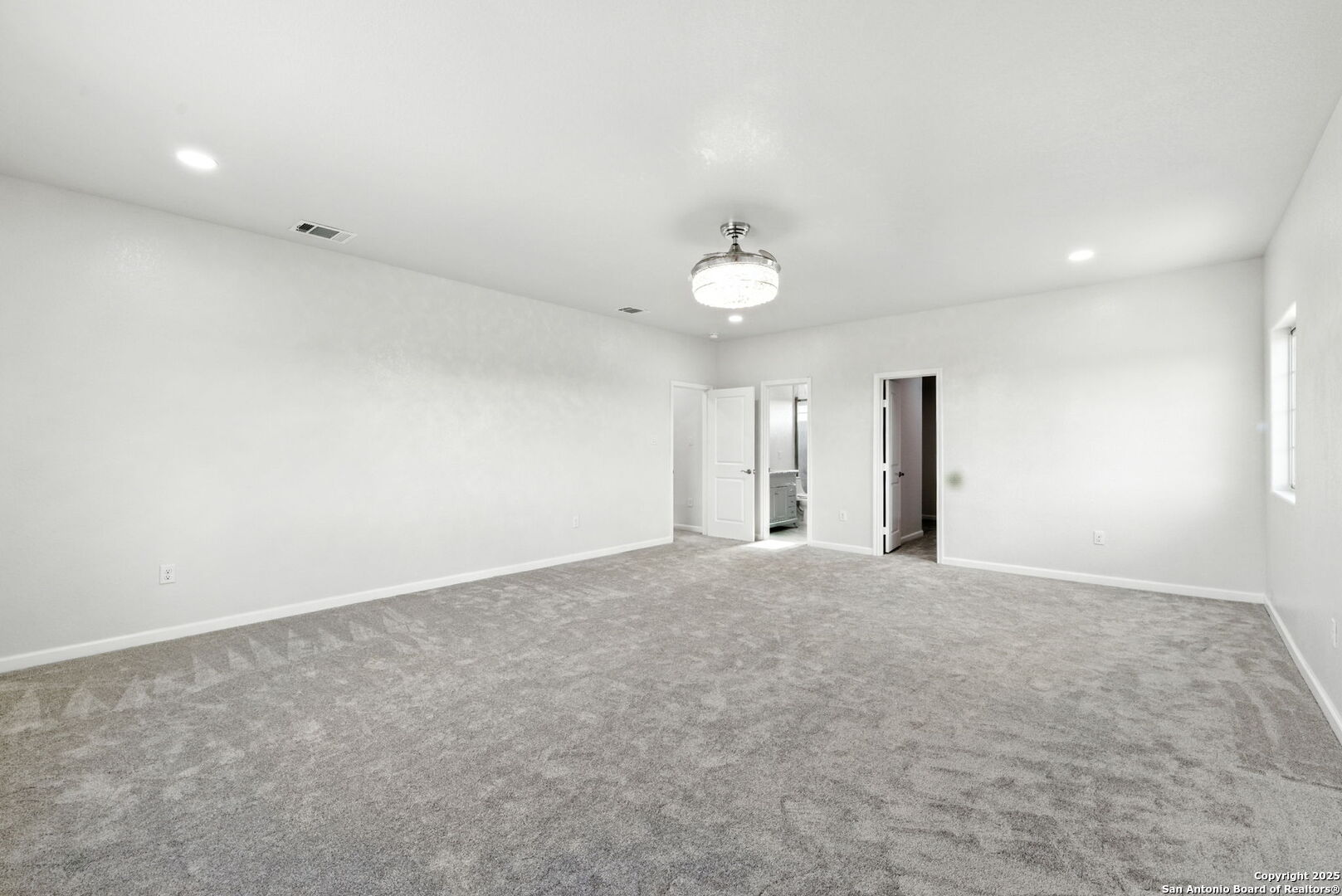774 County Road 6843 Lytle, TX 78052 - Photo 37 of 63 a view of an empty room with a window