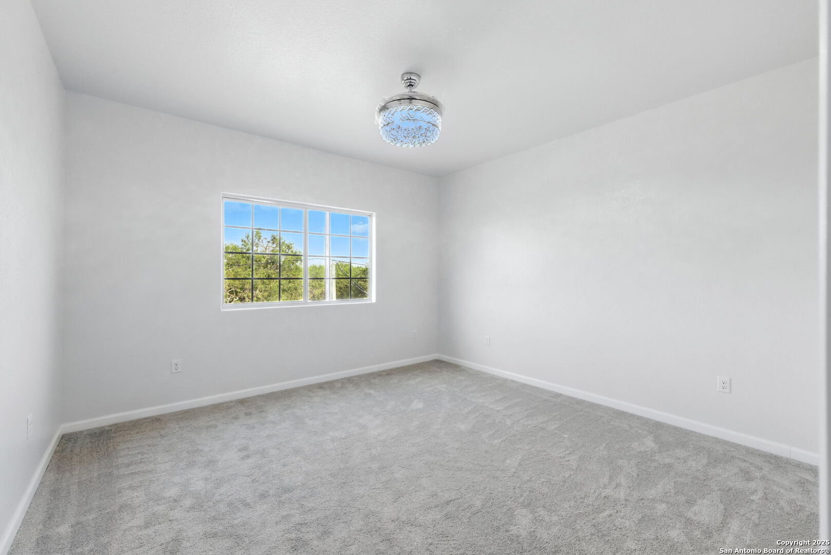 774 County Road 6843 Lytle, TX 78052 - Photo 49 of 63 an empty room with a window