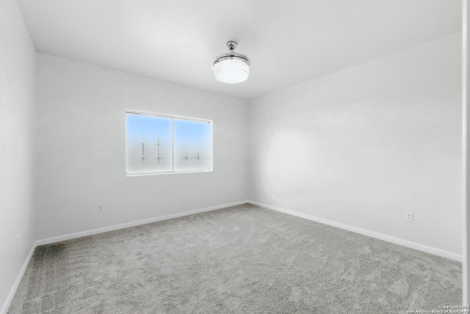774 County Road 6843 Lytle, TX 78052 - Photo 50 of 63 an empty room with a fan
