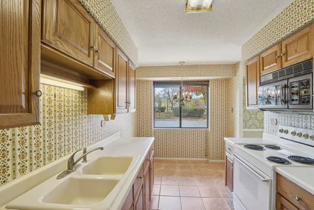 $210,000 | 35 South Baybrook Drive, Unit 114, Palatine, IL 60074