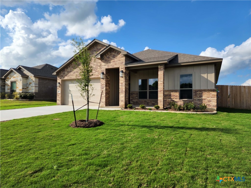 406 Talon Loop Salado, TX 76571 - Photo 2 of 31 a front view of a house with a yard