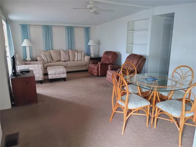 a kitchen with appliances cabinets and a sink