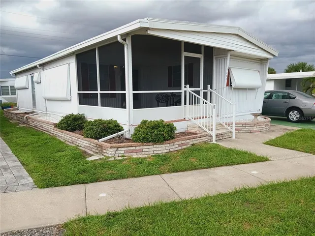 a house view with a garden space