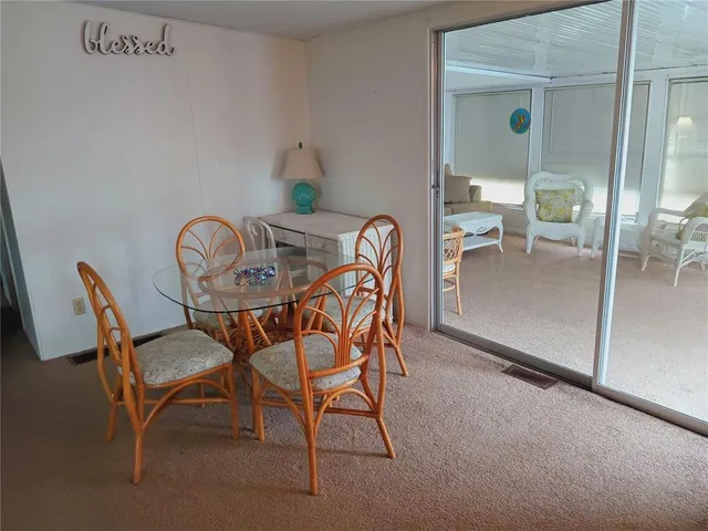 a bedroom with a bed and hallway