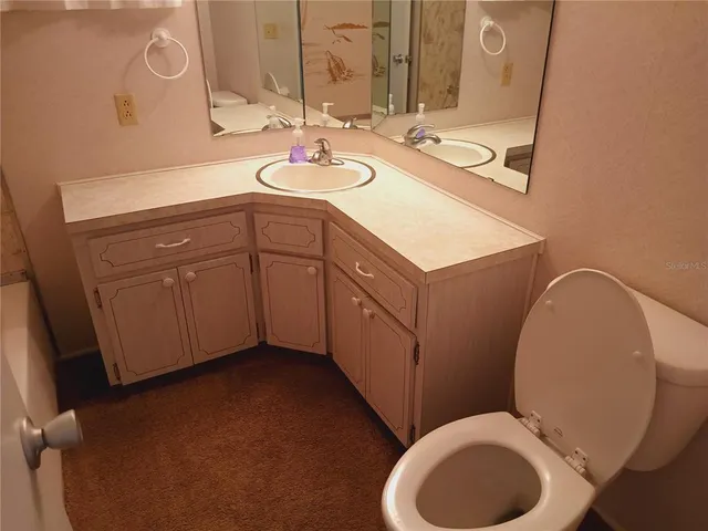 a sign that is on the side of the road