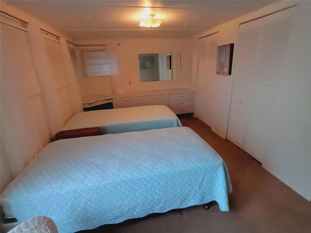 a view of an outdoor space and tennis court