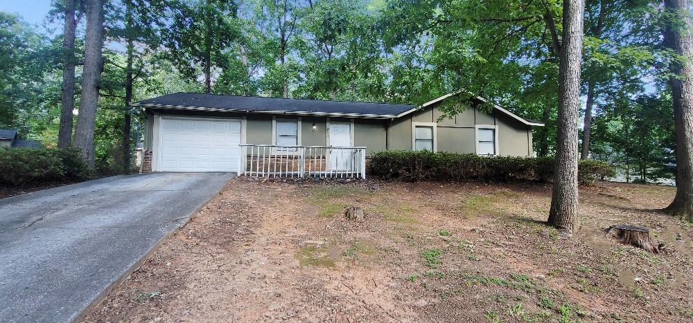 2099 Marble Arch Drive Decatur, GA 30035 - Photo 1 of 1 a house with trees in the background