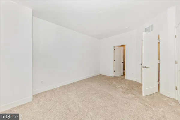 an empty room with an entryway