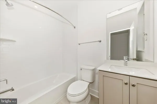 a view of a building with a street