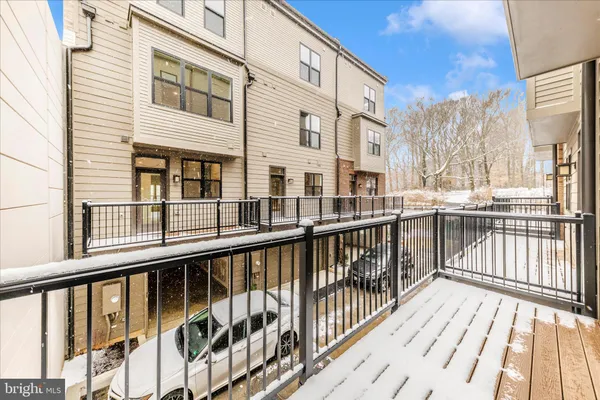 a view of a patio with swimming pool