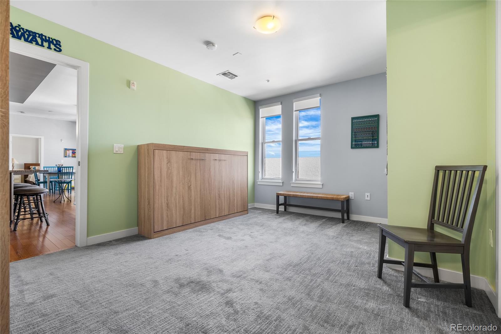 410 Acoma Street, Unit 511 Denver, CO 80204 - Photo 12 of 27 a view of a room with furniture and a window