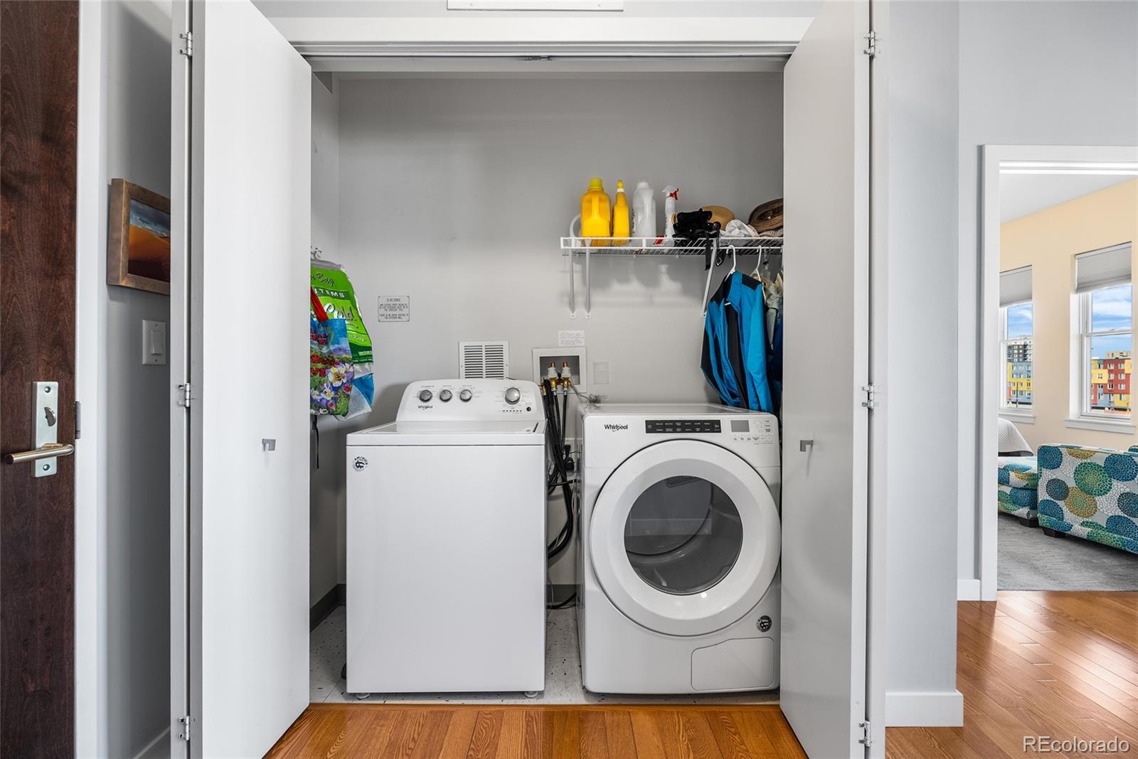 410 Acoma Street, Unit 511 Denver, CO 80204 - Photo 15 of 27 a utility room with dryer and washer