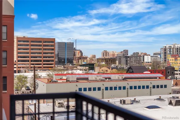 a view of a balcony with city view